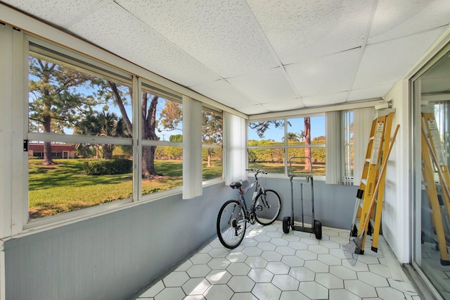 sunroom with a paneled ceiling