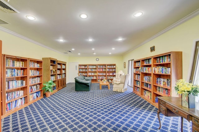 233 Down E Ln, Lake Worth, FL 33467 - living area featuring bookshelves, crown molding, carpet flooring, and recessed lighting
