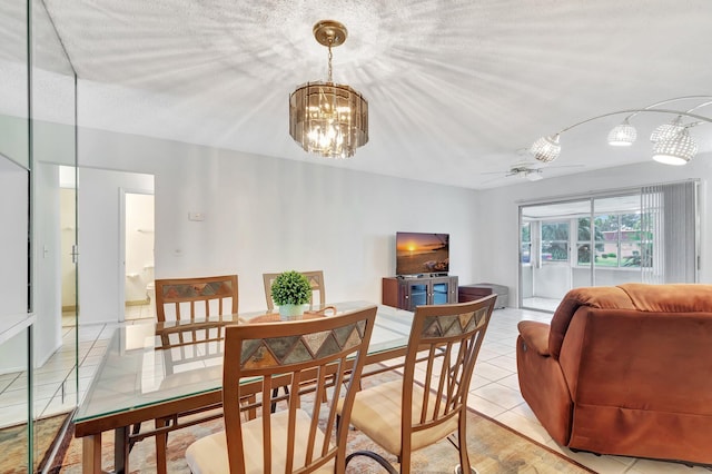 233 Down E Ln, Lake Worth, FL 33467 - dining room featuring tile patterned flooring and a chandelier