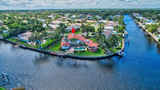 birds eye view of property featuring a water view and a residential view