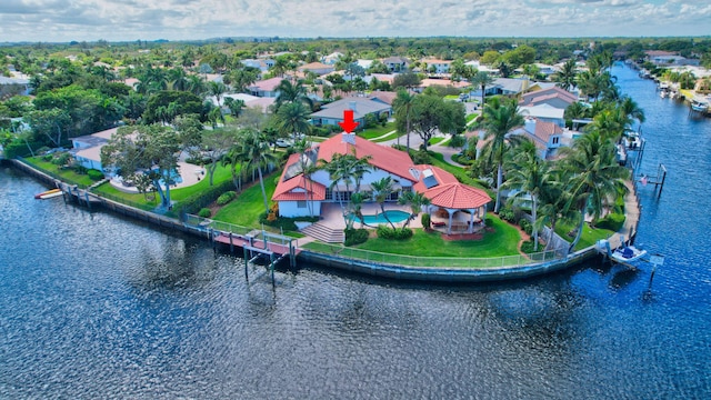 aerial view featuring a water view and a residential view