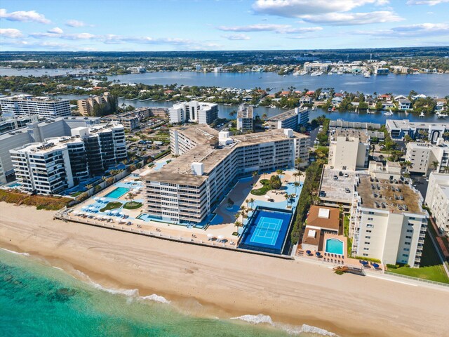 bird's eye view featuring a water view and a city view