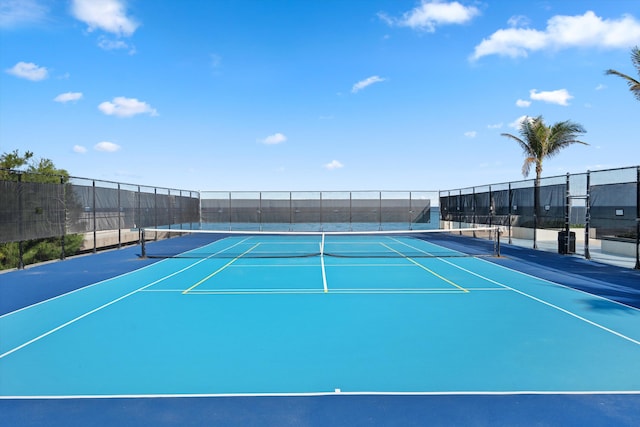 view of sport court with community basketball court and fence