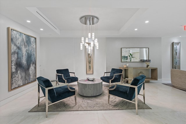 interior space with a tray ceiling and recessed lighting