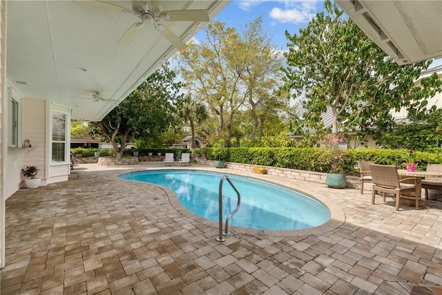 view of pool featuring ceiling fan, a fenced in pool, and a patio