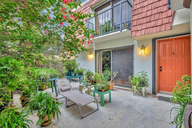 view of patio with a balcony