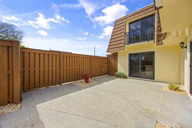 view of patio with fence