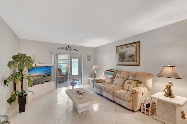 living area featuring light tile patterned flooring