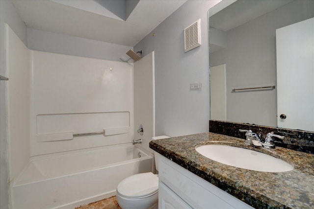 bathroom with shower / washtub combination, visible vents, vanity, and toilet