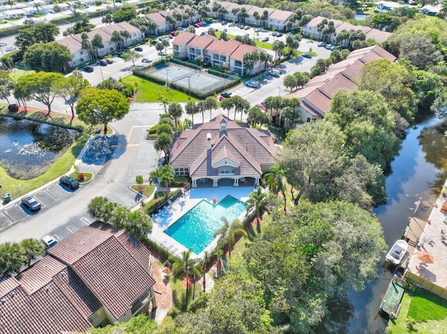 aerial view with a water view and a residential view