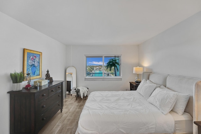 bedroom featuring wood finished floors