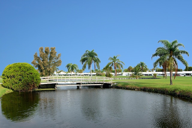 property view of water featuring a boat dock