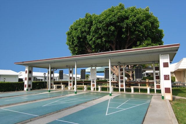 view of community with shuffleboard