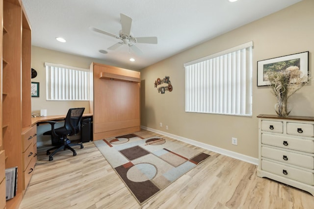 office space with recessed lighting, ceiling fan, light wood-style flooring, and baseboards