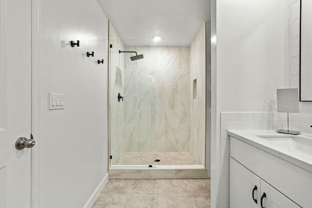 bathroom featuring vanity and a stall shower