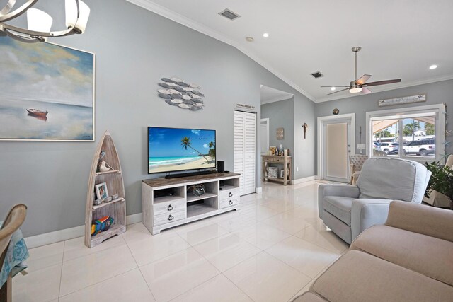 living area with lofted ceiling, visible vents, and crown molding