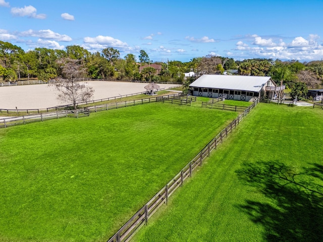 view of yard featuring an enclosed area and a rural view