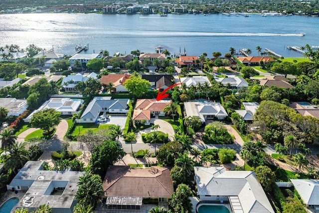 aerial view featuring a water view and a residential view