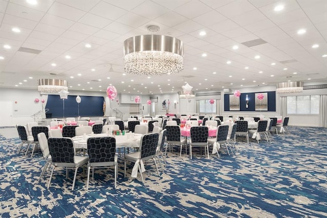 dining area with recessed lighting and carpet flooring