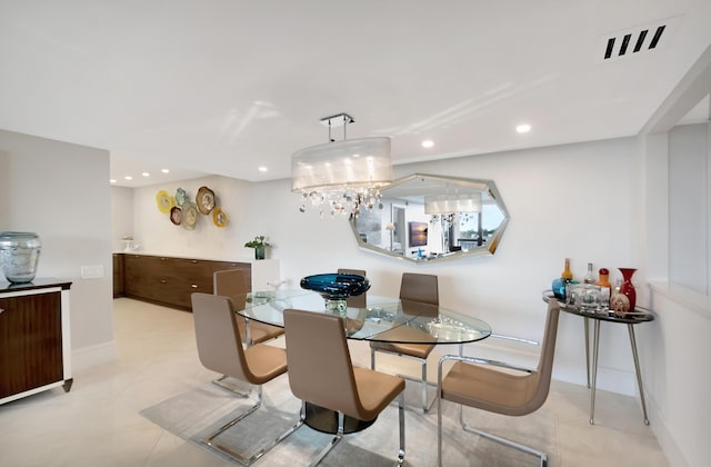 dining area with recessed lighting and baseboards