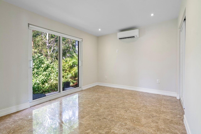 empty room featuring recessed lighting, baseboards, and a wall mounted AC