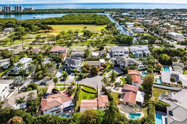 aerial view with a residential view and a water view