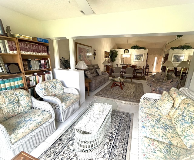 tiled living area with decorative columns