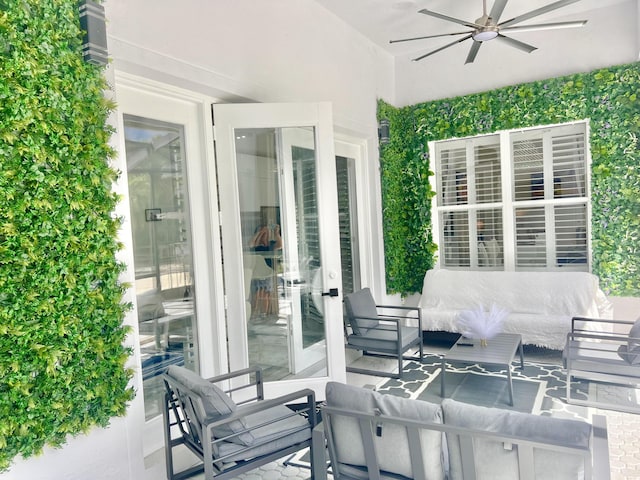 view of patio with an outdoor hangout area and a ceiling fan