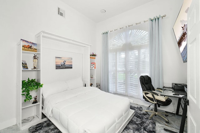 bedroom featuring visible vents