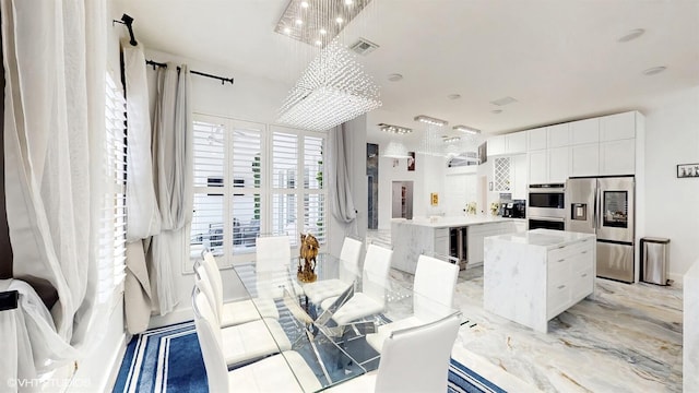 dining room featuring wine cooler and visible vents