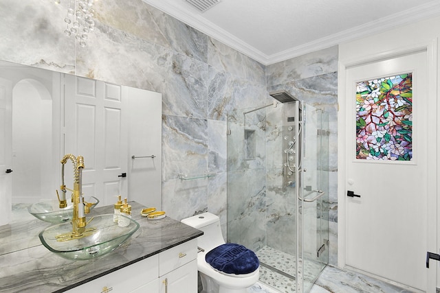 bathroom featuring vanity, a marble finish shower, toilet, and crown molding