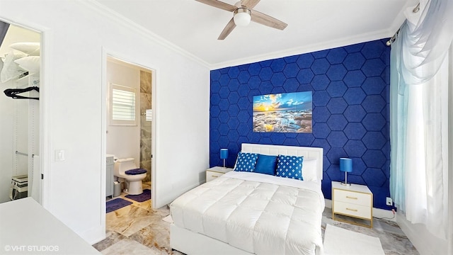 bedroom with ensuite bath, marble finish floor, ornamental molding, and a ceiling fan