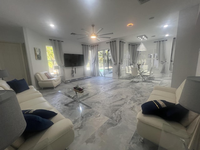 living area with marble finish floor and visible vents