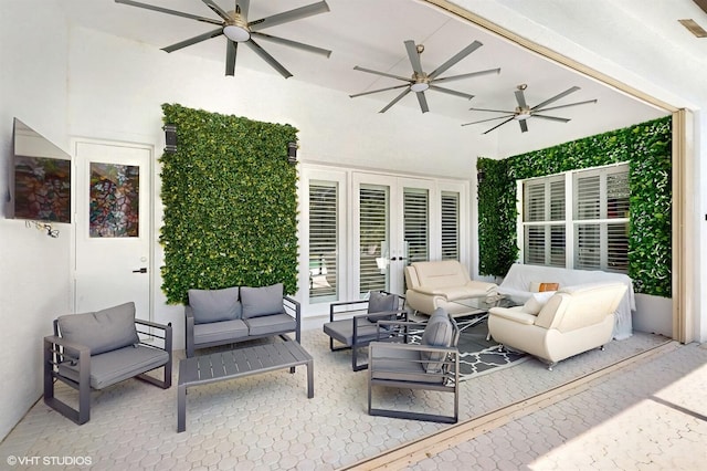 view of patio / terrace with outdoor lounge area and a ceiling fan