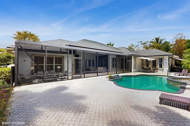outdoor pool featuring a patio area