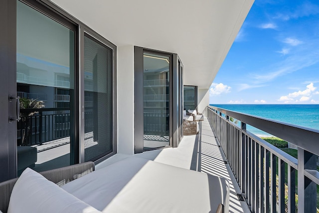 3140 S Ocean Blvd S Unit 502S, Palm Beach, FL 33480 - balcony featuring a view of the beach, a water view, and an outdoor hangout area