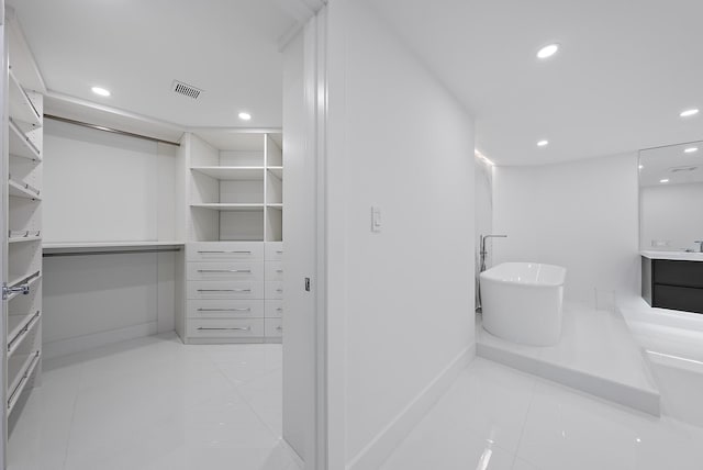 3140 S Ocean Blvd S Unit 502S, Palm Beach, FL 33480 - full bathroom featuring tile patterned flooring, visible vents, recessed lighting, and a walk in closet