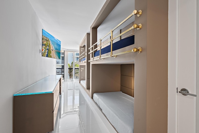 3140 S Ocean Blvd S Unit 502S, Palm Beach, FL 33480 - hallway featuring tile patterned flooring and expansive windows