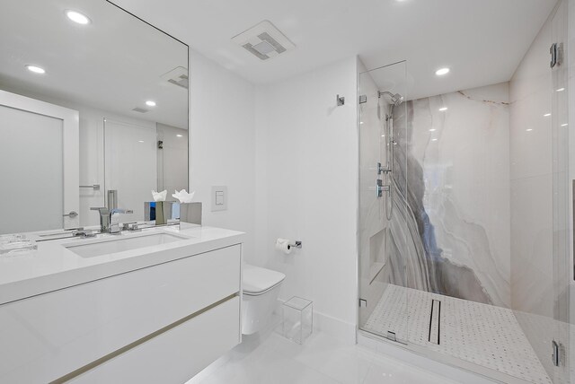 3140 S Ocean Blvd S Unit 502S, Palm Beach, FL 33480 - full bathroom featuring vanity, toilet, and a marble finish shower
