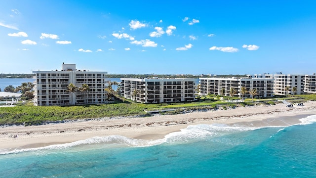 3140 S Ocean Blvd S Unit 502S, Palm Beach, FL 33480 - drone / aerial view featuring a water view and a beach view