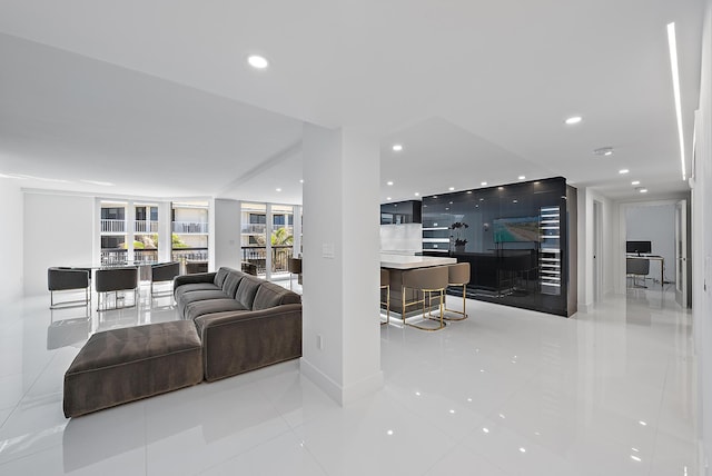 3140 S Ocean Blvd S Unit 502S, Palm Beach, FL 33480 - tiled living room featuring floor to ceiling windows and recessed lighting