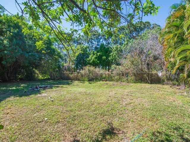 view of yard with fence