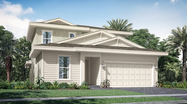 view of front of house featuring a garage, a front lawn, and decorative driveway