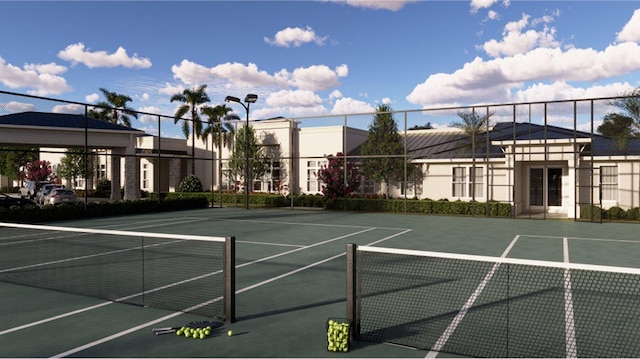 view of tennis court with fence