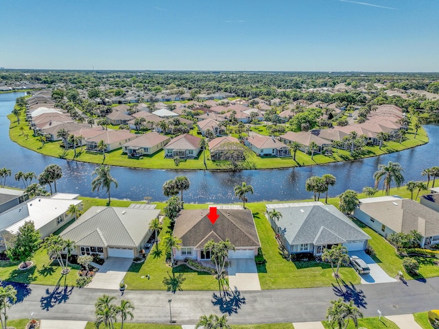 aerial view with a water view and a residential view