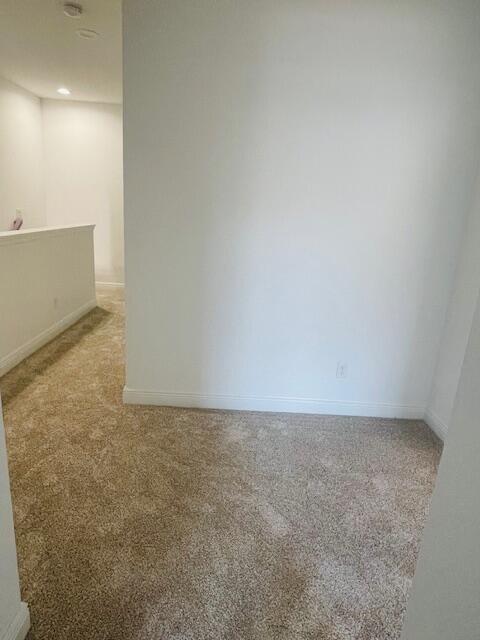 956 NE Trailside Run, Port Saint Lucie, FL 34983 - spare room with carpet flooring and recessed lighting