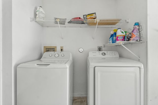 washroom with laundry area and washing machine and clothes dryer