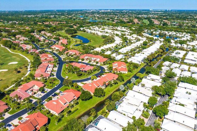 birds eye view of property featuring a water view, a residential view, and golf course view