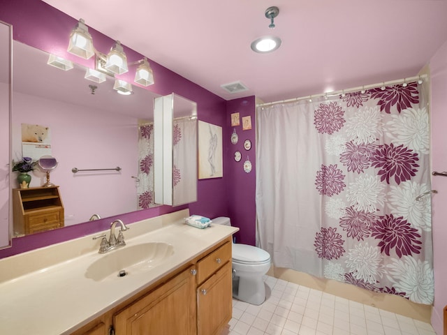 full bath with visible vents, vanity, toilet, and tile patterned floors