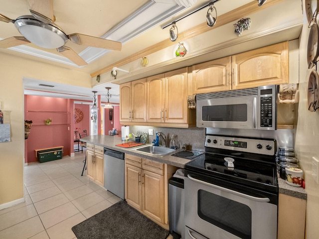 kitchen with a ceiling fan, appliances with stainless steel finishes, light brown cabinets, a sink, and light tile patterned flooring